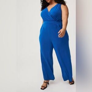 NWT Torrid 4 (4X) Jumpsuit Studio Knit Surplice Tie Back Blue Wide Leg Pockets